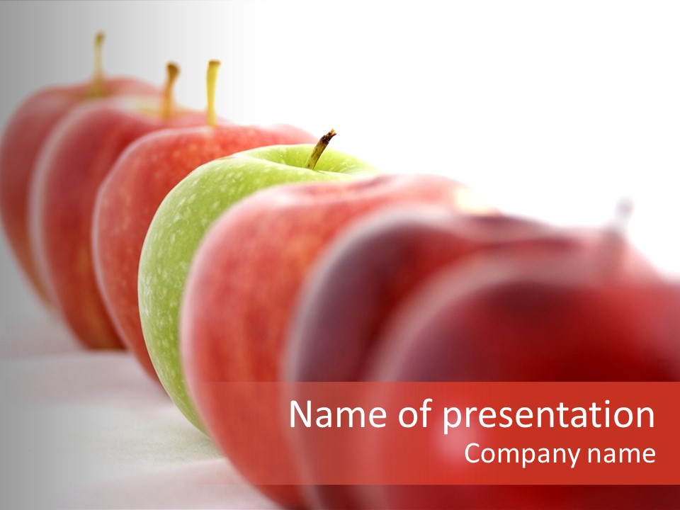 A Green Apple Is The Odd One Out In A Line Of Red PowerPoint Template