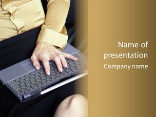 A Woman Is Typing On A Laptop Computer PowerPoint Template