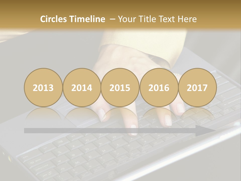 A Woman Is Typing On A Laptop Computer PowerPoint Template