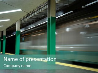 A Train Moving Through A Train Station Powerpoint Presentation PowerPoint Template