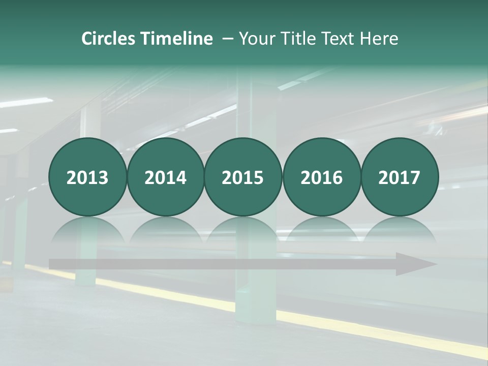 A Train Moving Through A Train Station Powerpoint Presentation PowerPoint Template