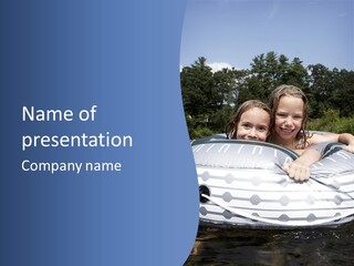 Two Young Children Having Fun Playing In The River During A Hot Summer Day PowerPoint Template