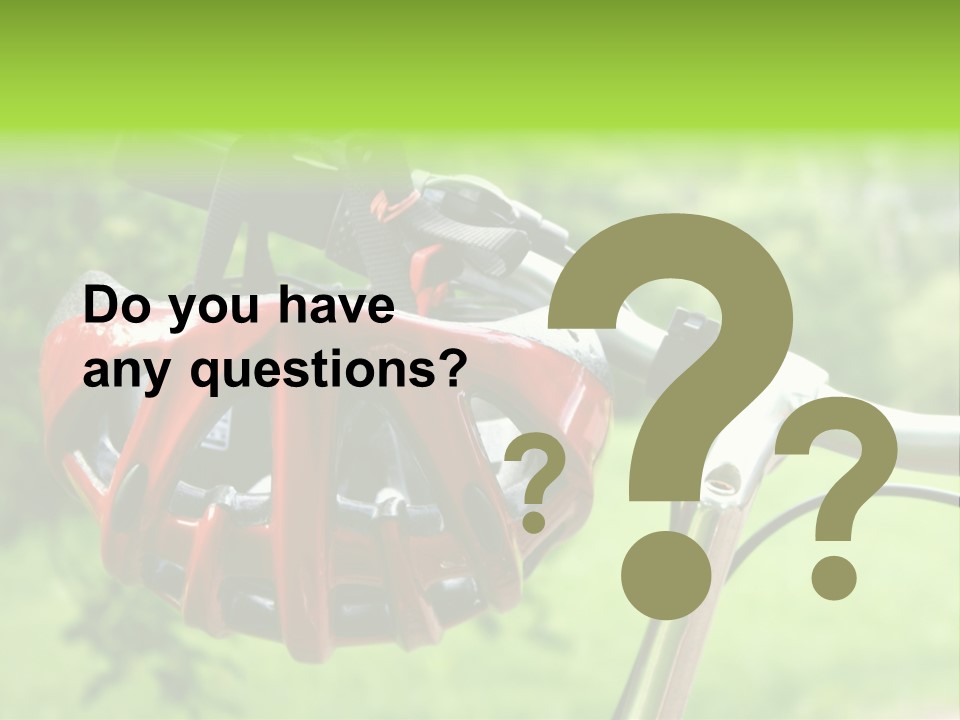 A Red Bicycle Helmet On The Handlebars Of A Bicycle PowerPoint Template