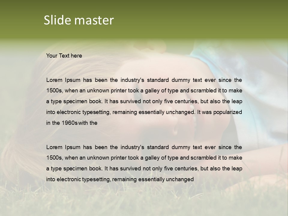 Six Year Old Boy Lying Down In The Grass. PowerPoint Template