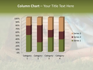 Six Year Old Boy Lying Down In The Grass. PowerPoint Template