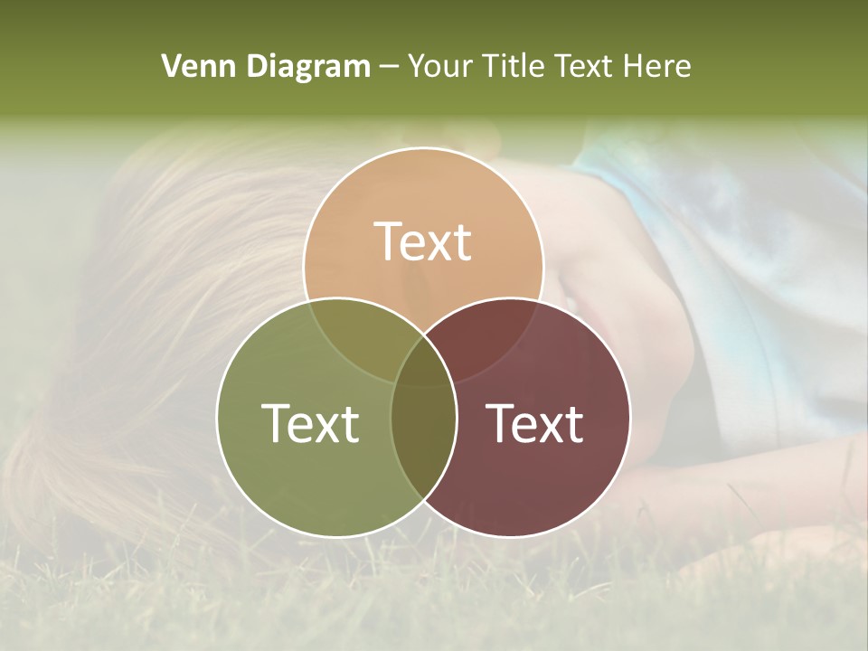 Six Year Old Boy Lying Down In The Grass. PowerPoint Template