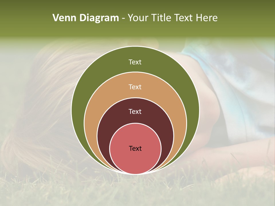 Six Year Old Boy Lying Down In The Grass. PowerPoint Template
