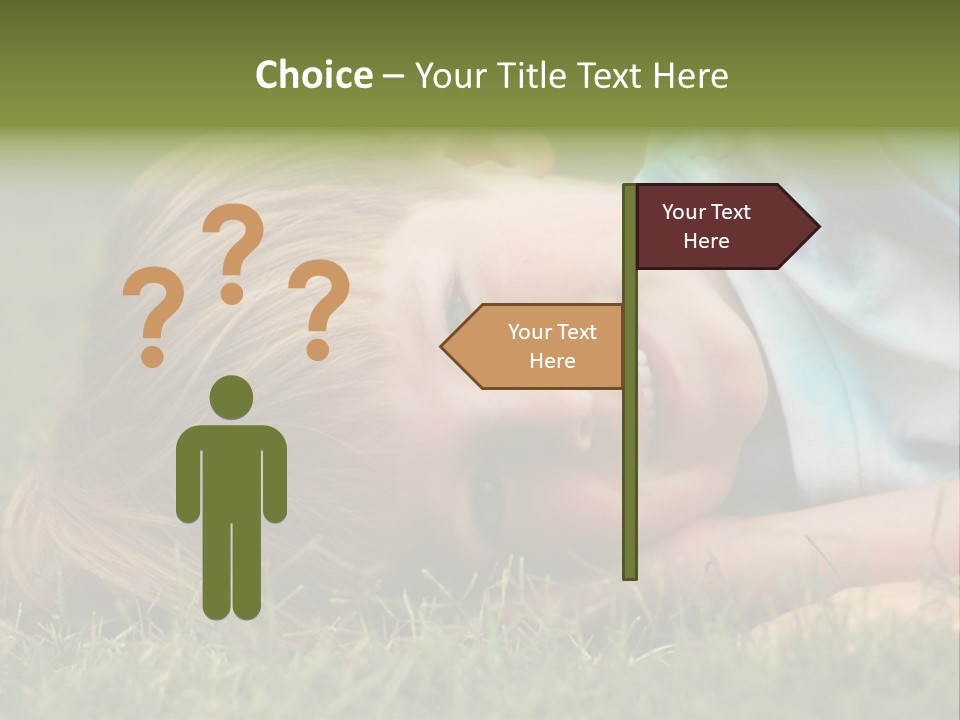 Six Year Old Boy Lying Down In The Grass. PowerPoint Template