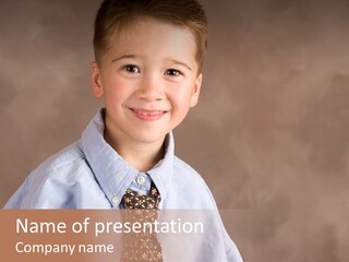 Portrait Of A Filipino Boy Dressed Up In Adult Business Clothes PowerPoint Template