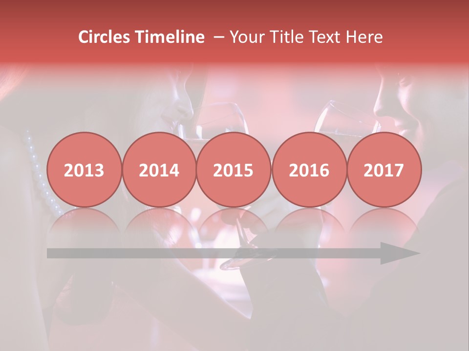 Young Couple Sharing A Glass Of Red Wine In Restaurant, Celebrating Or On Romantic Date PowerPoint Template