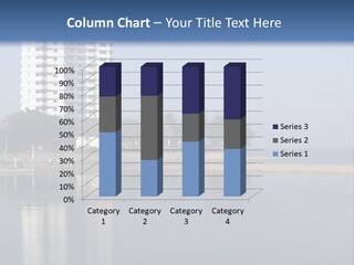 A Large White Building Sitting Next To A Body Of Water PowerPoint Template