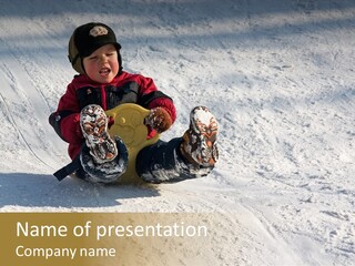 A Small Child Is Sitting In The Snow On A Snowboard PowerPoint Template