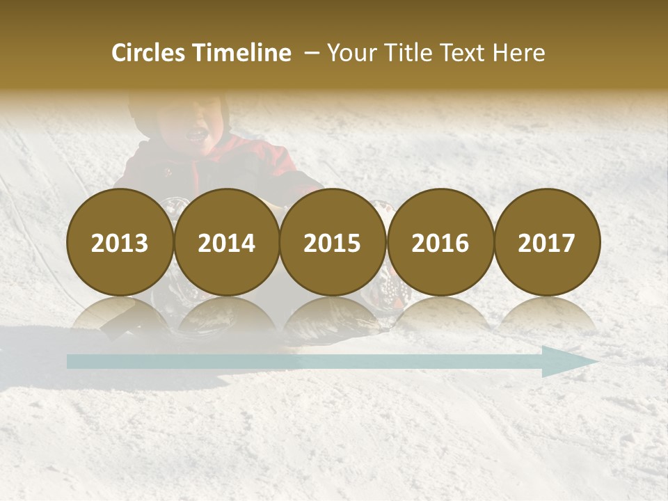 A Small Child Is Sitting In The Snow On A Snowboard PowerPoint Template