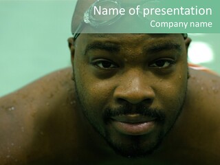 A Close Up Of A Man Wearing A Swimming Cap PowerPoint Template