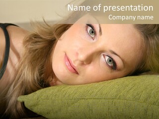 A Beautiful Woman Laying On Top Of A Green Pillow PowerPoint Template
