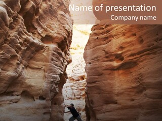 Girl Climbing In The Canyon Walls PowerPoint Template