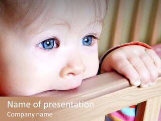 Little Baby Standing In Crib Bitting On Rail PowerPoint Template