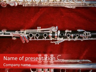 Silver Flute,Trumpet And Clarinet On Red Velvet Background PowerPoint Template
