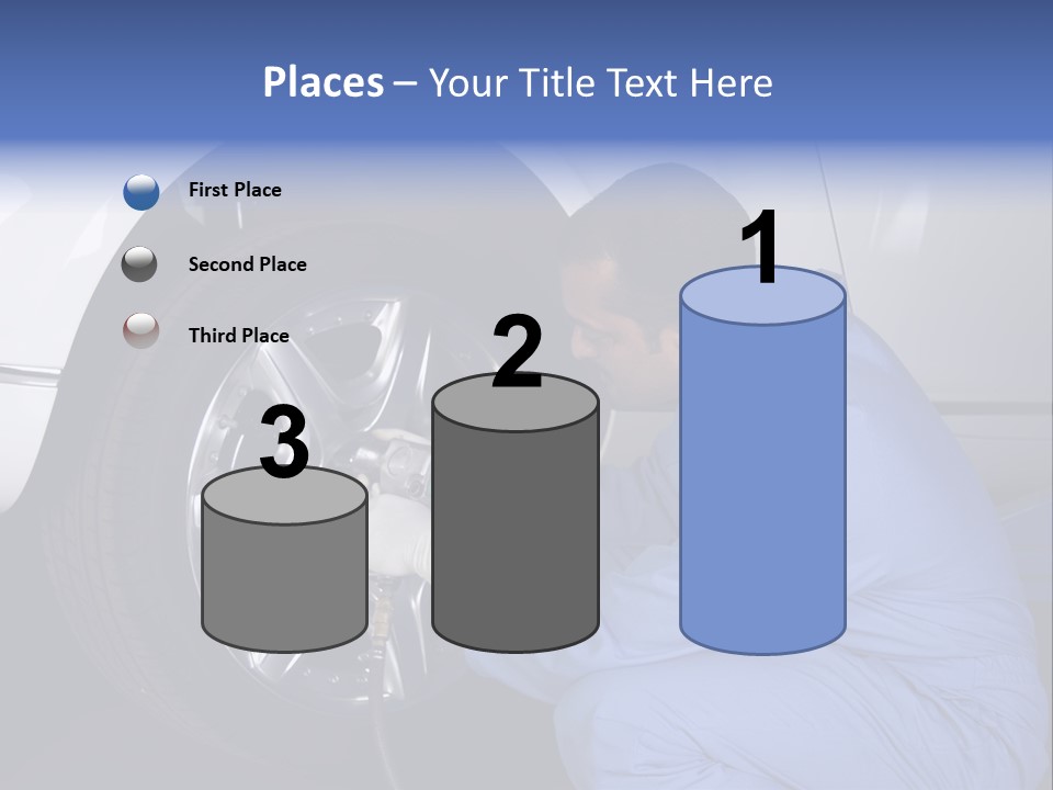 Auto Mechanic Removing Wheel Of A Car In A Workshop PowerPoint Template