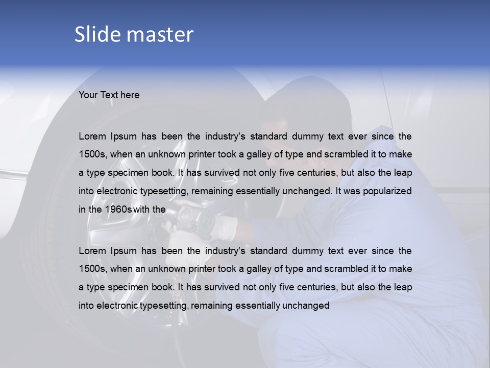 Auto Mechanic Removing Wheel Of A Car In A Workshop PowerPoint Template