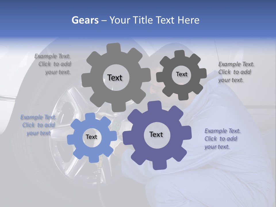 Auto Mechanic Removing Wheel Of A Car In A Workshop PowerPoint Template