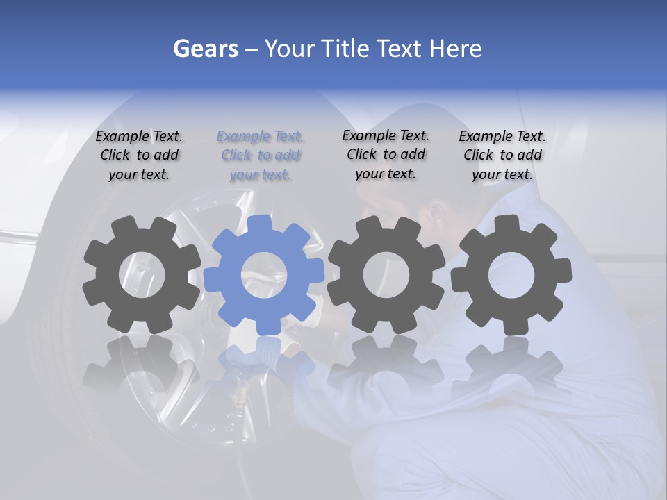 Auto Mechanic Removing Wheel Of A Car In A Workshop PowerPoint Template