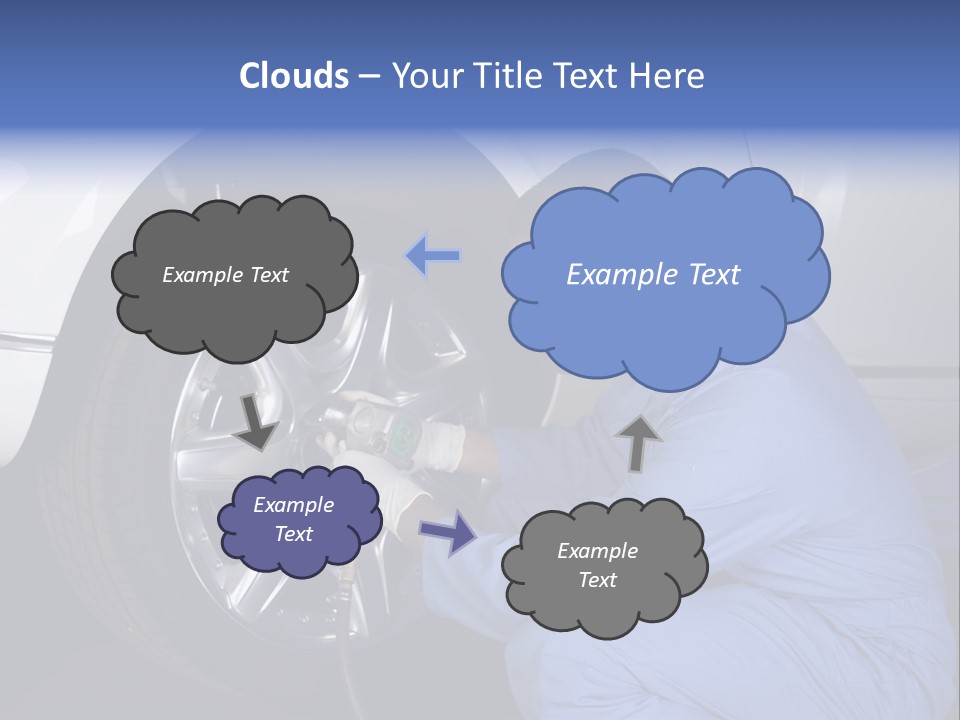 Auto Mechanic Removing Wheel Of A Car In A Workshop PowerPoint Template