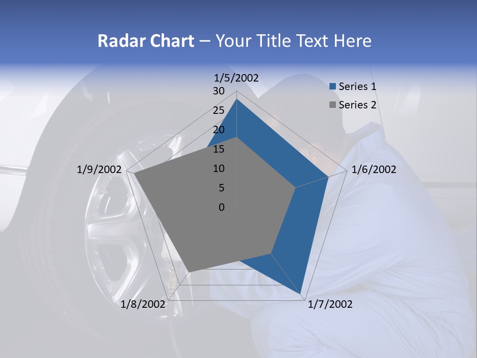 Auto Mechanic Removing Wheel Of A Car In A Workshop PowerPoint Template