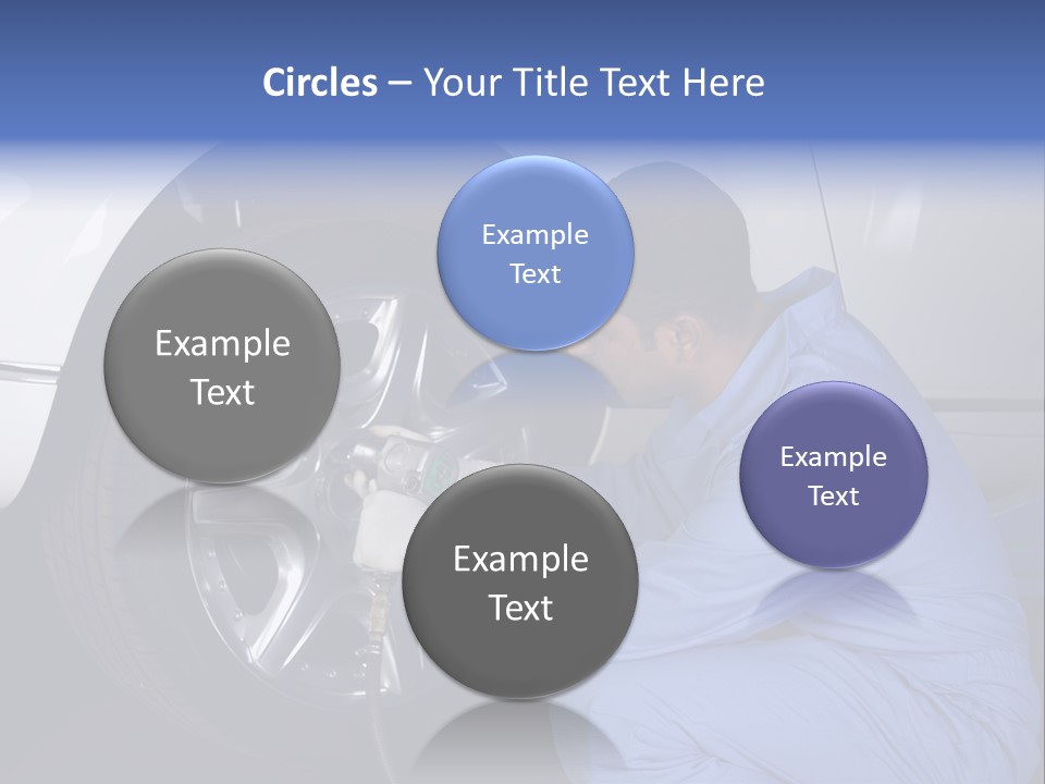 Auto Mechanic Removing Wheel Of A Car In A Workshop PowerPoint Template