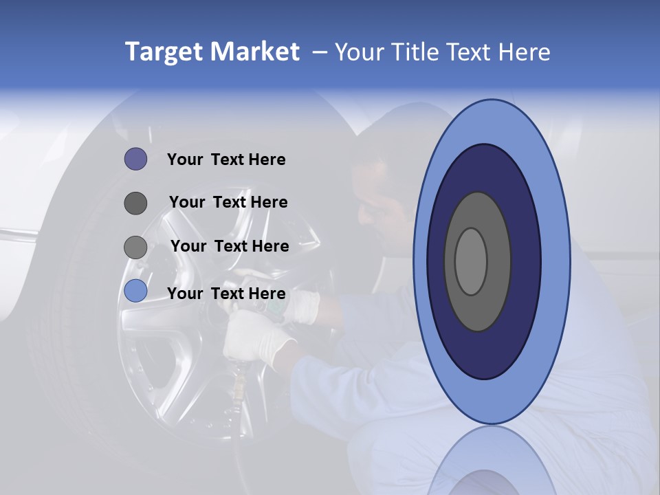 Auto Mechanic Removing Wheel Of A Car In A Workshop PowerPoint Template