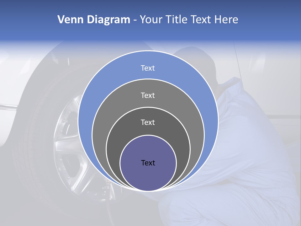 Auto Mechanic Removing Wheel Of A Car In A Workshop PowerPoint Template