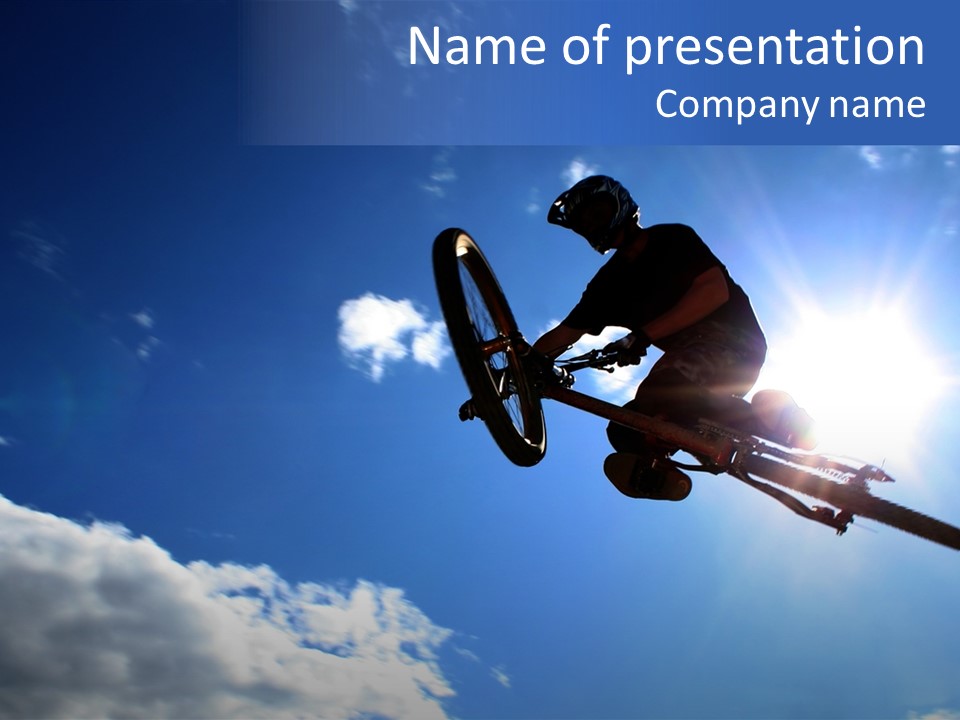 A Mountainbiker Flys Across The Sky During A Freeriding Contest Held In Whistler, Bc. PowerPoint Template