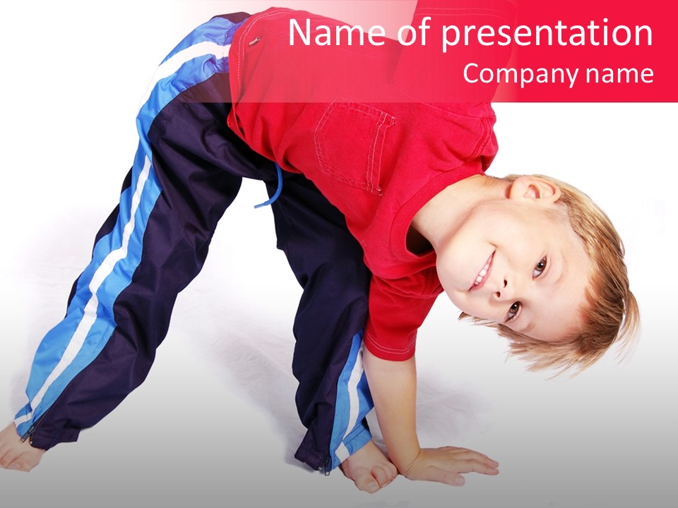 A Cute Four Year Old Boy Wearing Red And Blue Bending Over To Touch His Right Toes. PowerPoint Template