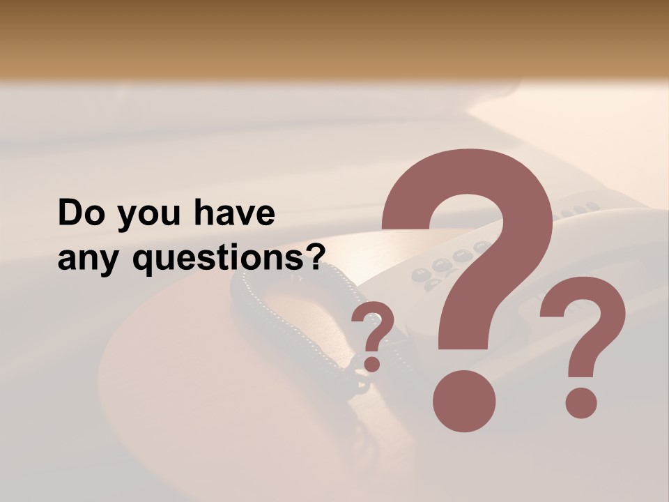 A Phone On A Table Next To A Bed PowerPoint Template