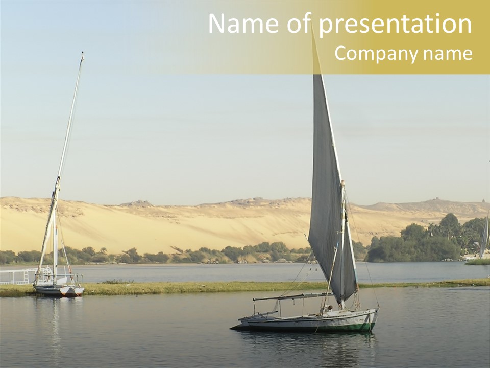 Sailing Boats On The Nile At Aswan, Egypt PowerPoint Template