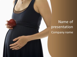 Portrait Of Caucasion Mid-Adult Pregnant Woman With Hands On Belly Holding An Apple. PowerPoint Template