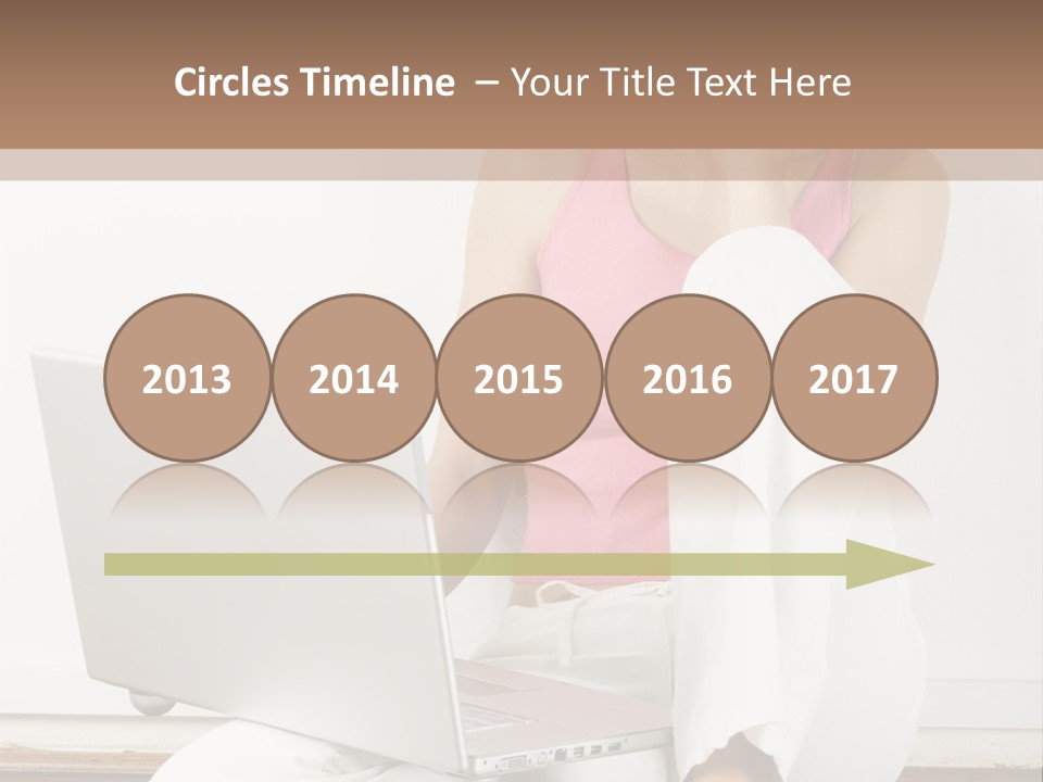 A Pretty Young Woman Sitting On Wooden Floor With Laptop And Mobile Phone PowerPoint Template