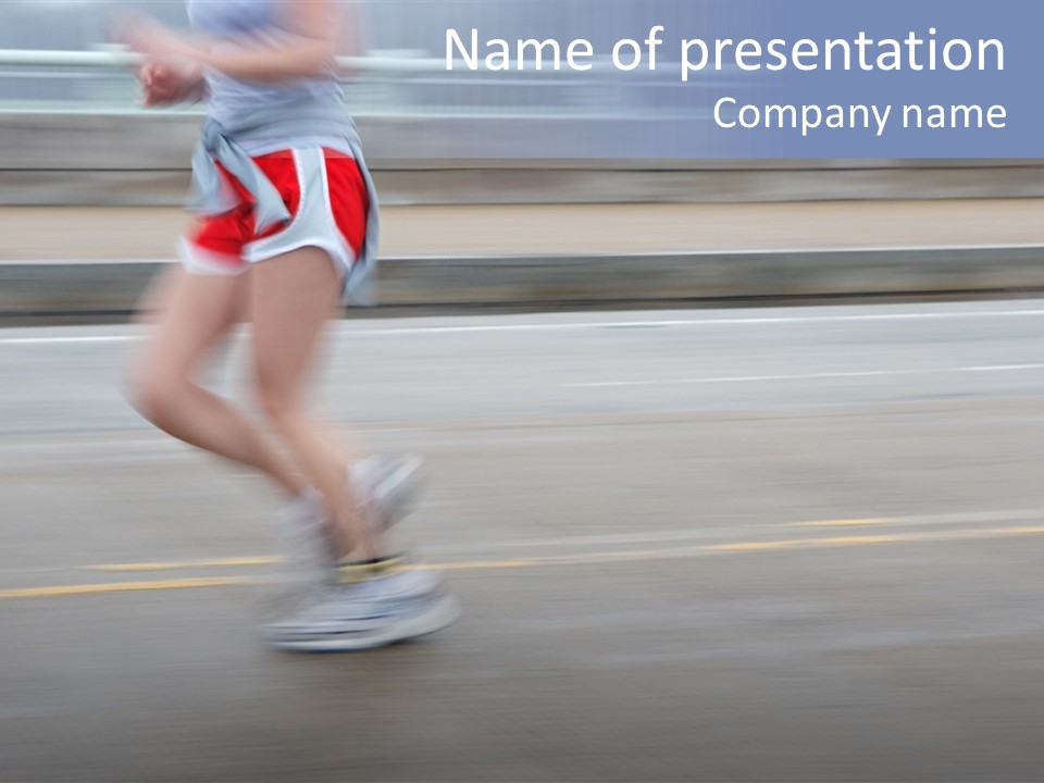 A Woman Running On A Road With A Blurry Background PowerPoint Template