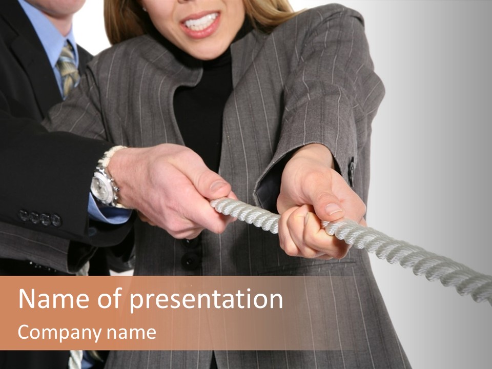 A Business Team Playing Tug Of War In An Intense Struggle PowerPoint Template