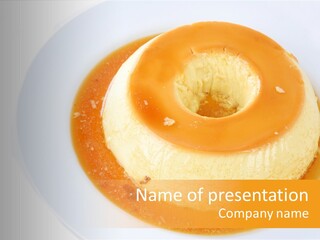 A White Plate Topped With A Pastry Covered In Orange Sauce PowerPoint Template