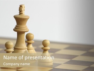 A Group Of Chess Pieces On A Chess Board PowerPoint Template