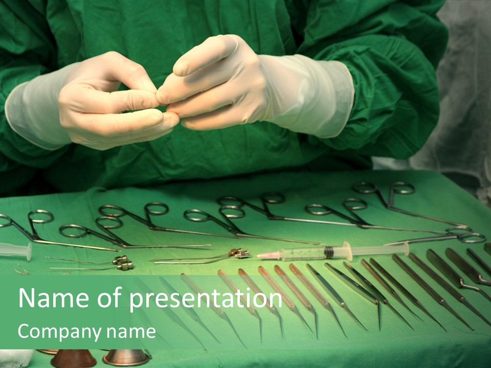 A Surgeon In Green Scrubs His Hands Over A Green Table PowerPoint Template