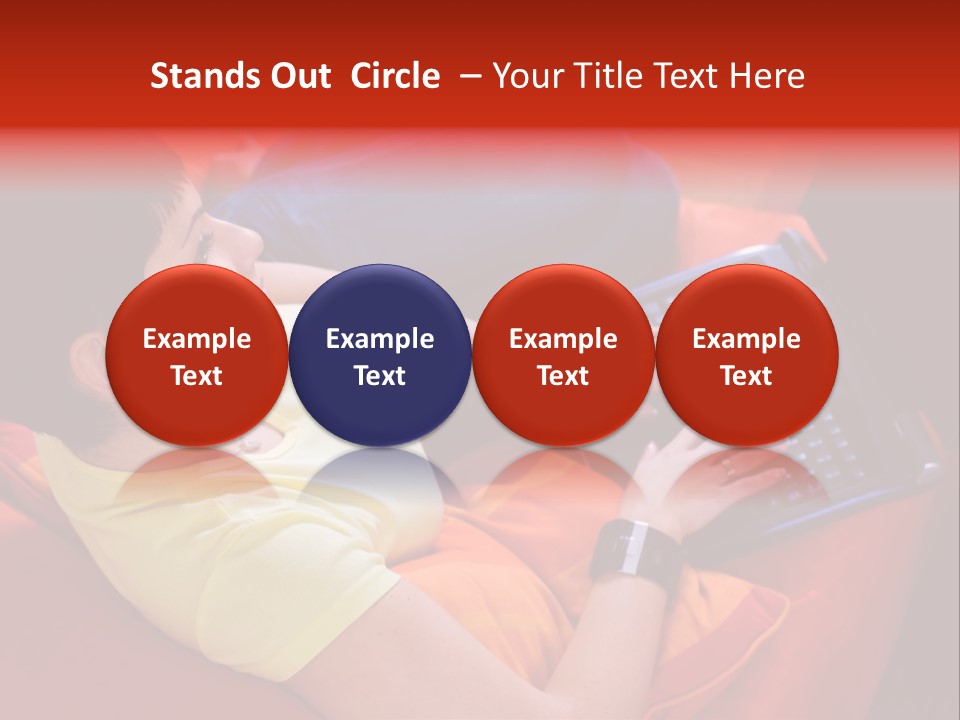 A Woman Sitting On A Couch Using A Laptop Computer PowerPoint Template