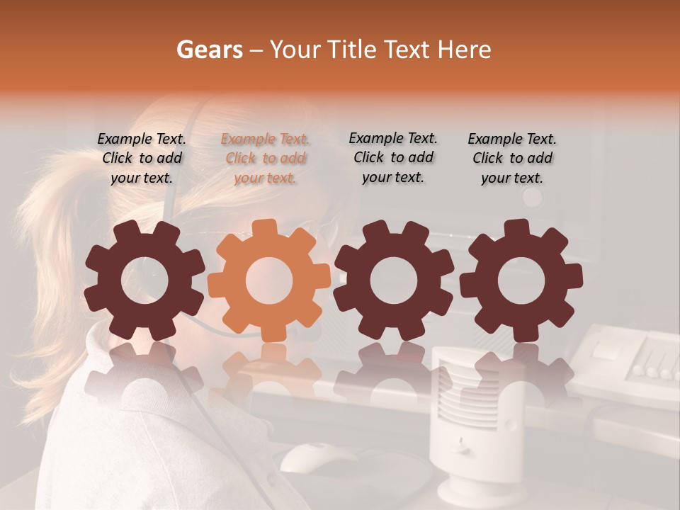 A Woman With A Headset Is Sitting In Front Of A Computer PowerPoint Template