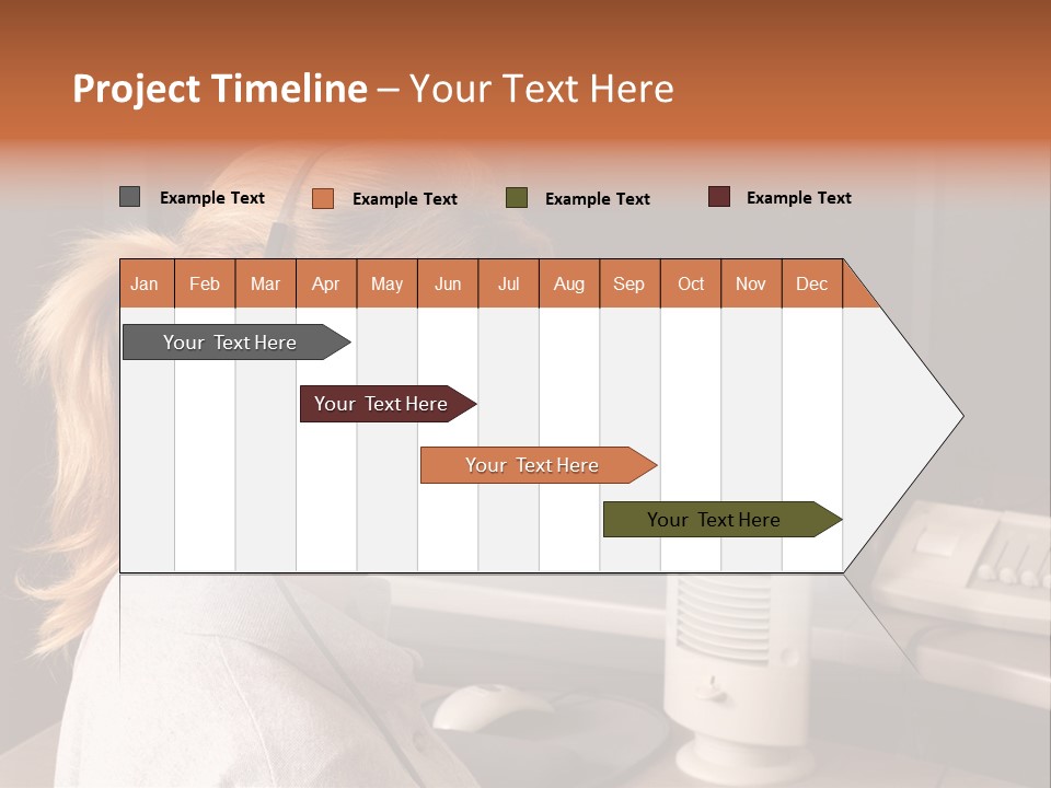 A Woman With A Headset Is Sitting In Front Of A Computer PowerPoint Template