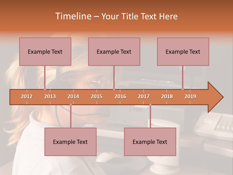A Woman With A Headset Is Sitting In Front Of A Computer PowerPoint Template