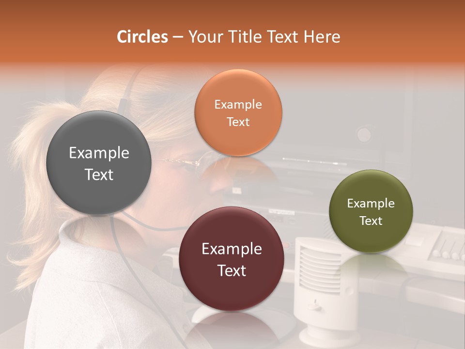 A Woman With A Headset Is Sitting In Front Of A Computer PowerPoint Template