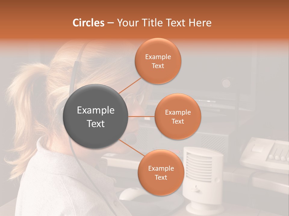 A Woman With A Headset Is Sitting In Front Of A Computer PowerPoint Template
