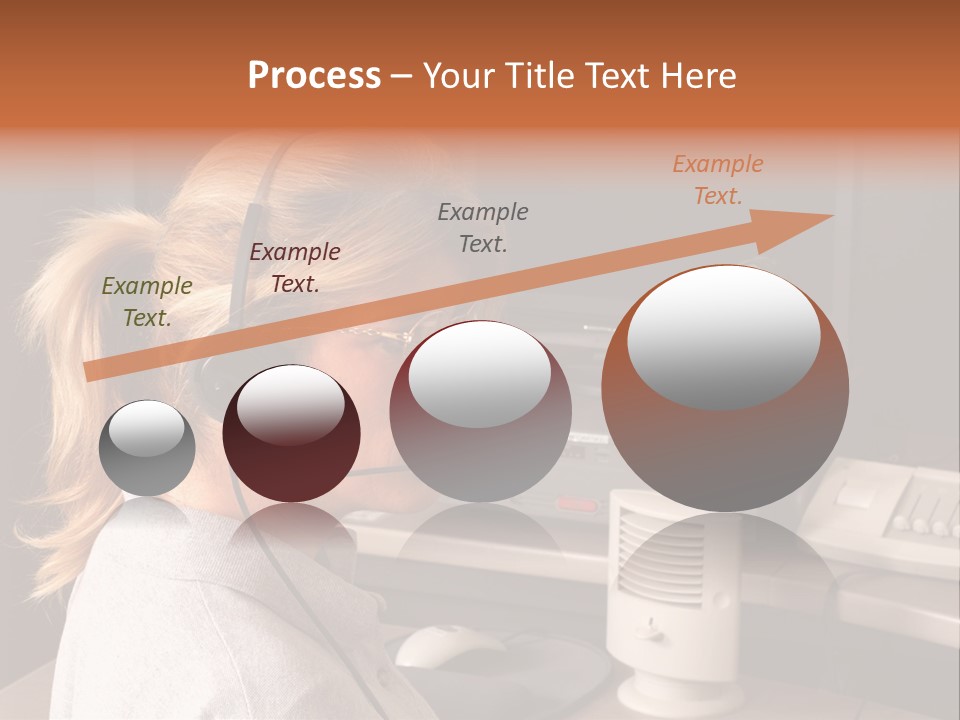 A Woman With A Headset Is Sitting In Front Of A Computer PowerPoint Template