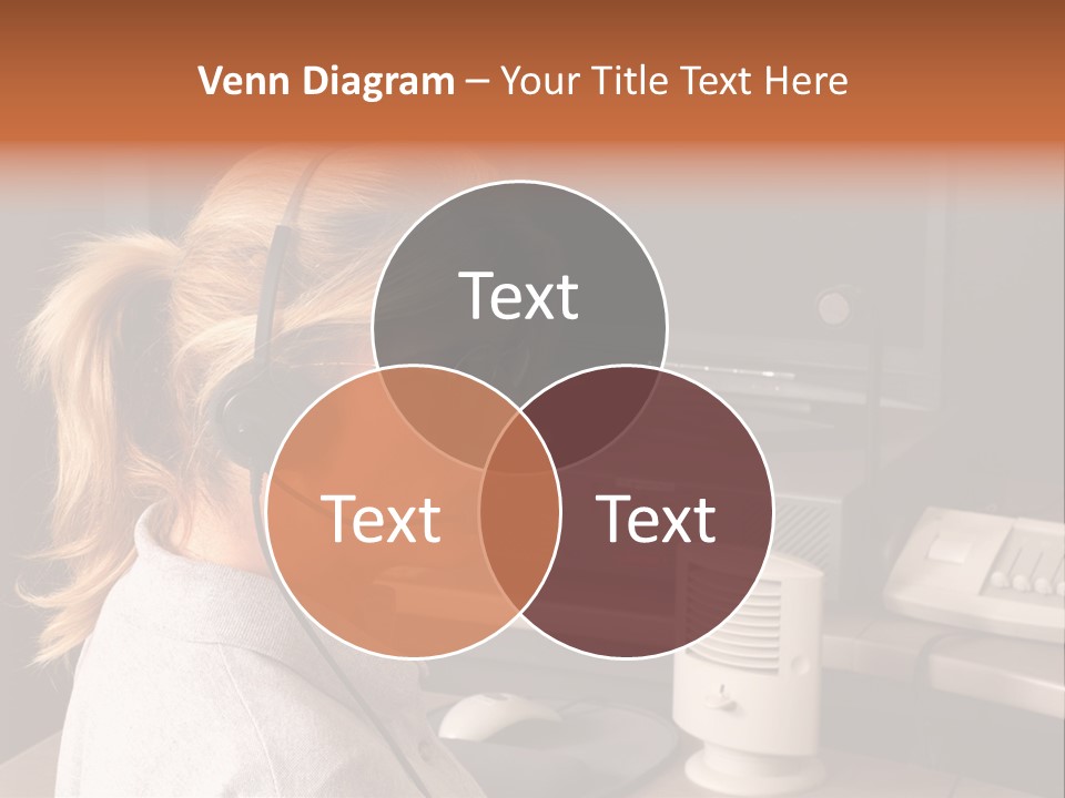 A Woman With A Headset Is Sitting In Front Of A Computer PowerPoint Template